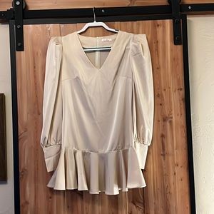 Really Cute Satin Look Champagne colored ruffled mini dress.